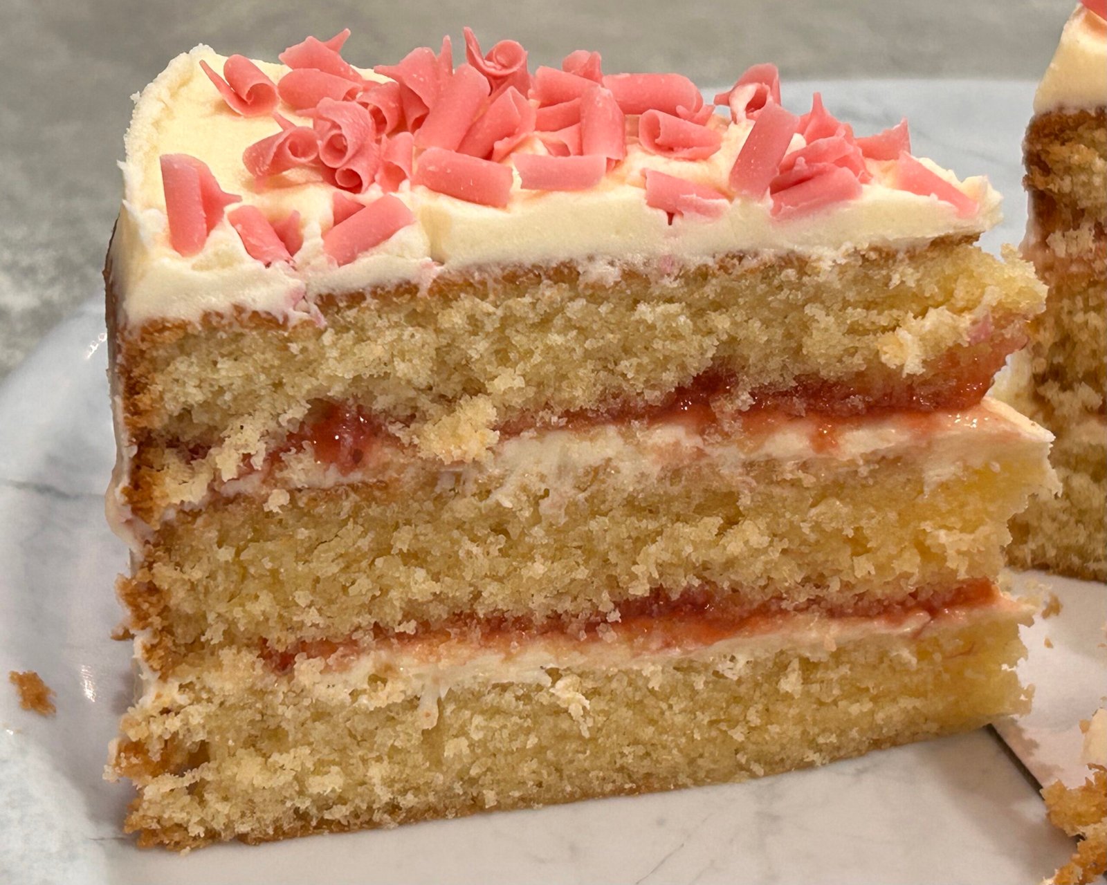 slice of vanilla berry cake slice of vanilla berry cake