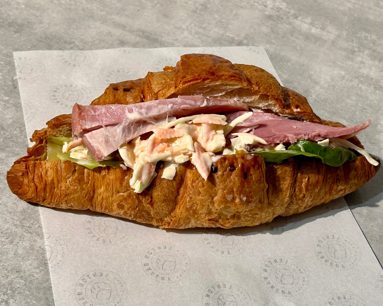 croissant home roasted ham, lettuce & coleslaw croissant home roasted ham, lettuce & coleslaw