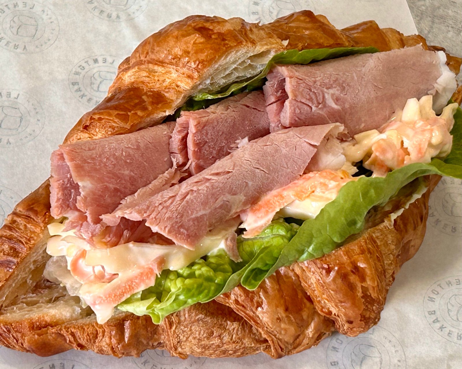 croissant home roasted ham, lettuce & coleslaw